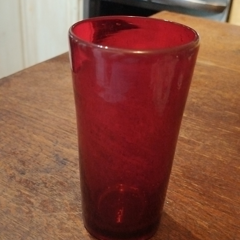 Ruby red drinking glass.  52GW2